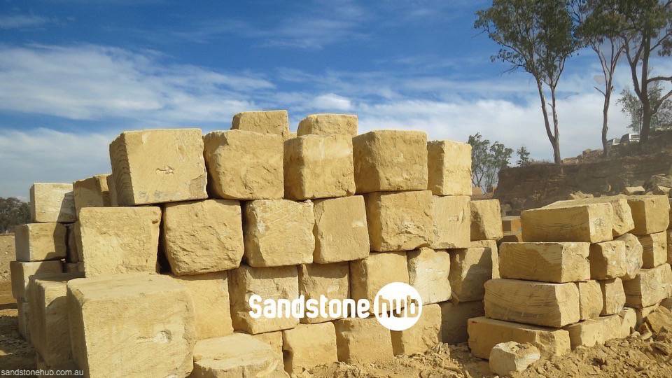 Sandstone AGrade 5 Wheel Sawn Sides Yellow Stacked in Quarry Reserve