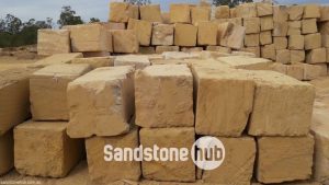 Sandstone BGrade Premium Yellow Blocks and Logs Stacked In Quarry Yard