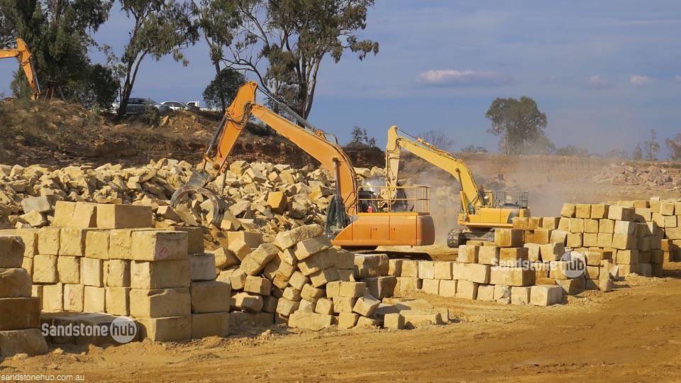 Sandstone Quarry Block Stacking and Processing with Heavy Machinery