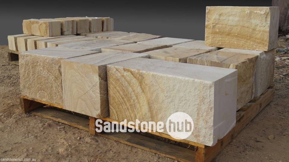 Sandstone Blocks and Logs Rockfaced with Diamond Sawn Sides Yellow Colour Stacked on Pallet