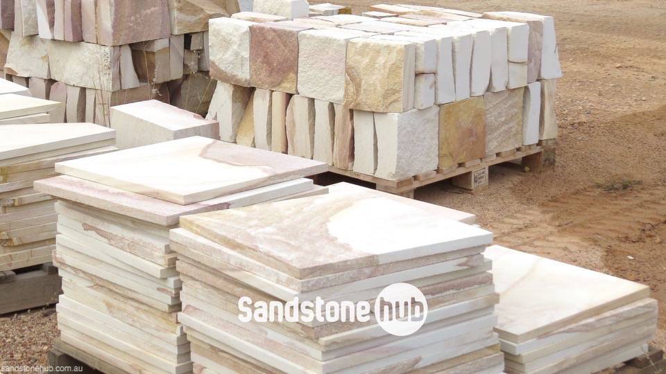 Sandstone Pavers, Tiles and Bricks Diamond Sawn and Rockfaced Products on Pallets in Reserve Yard Yellow, White and Brown Mixed Colours