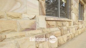 Sandstone Rockfaced Wall Cladding on Front of House Yellows and Brown Colours